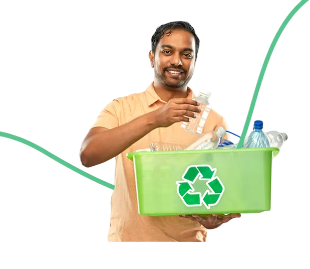 Person holding recycling bin with plastic bottles